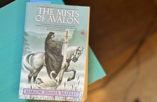 Visual: Book cover for The Mists of Avalon, the magical saga of the women behind King Arthur's throne, by Marion Zimmer Bradley
